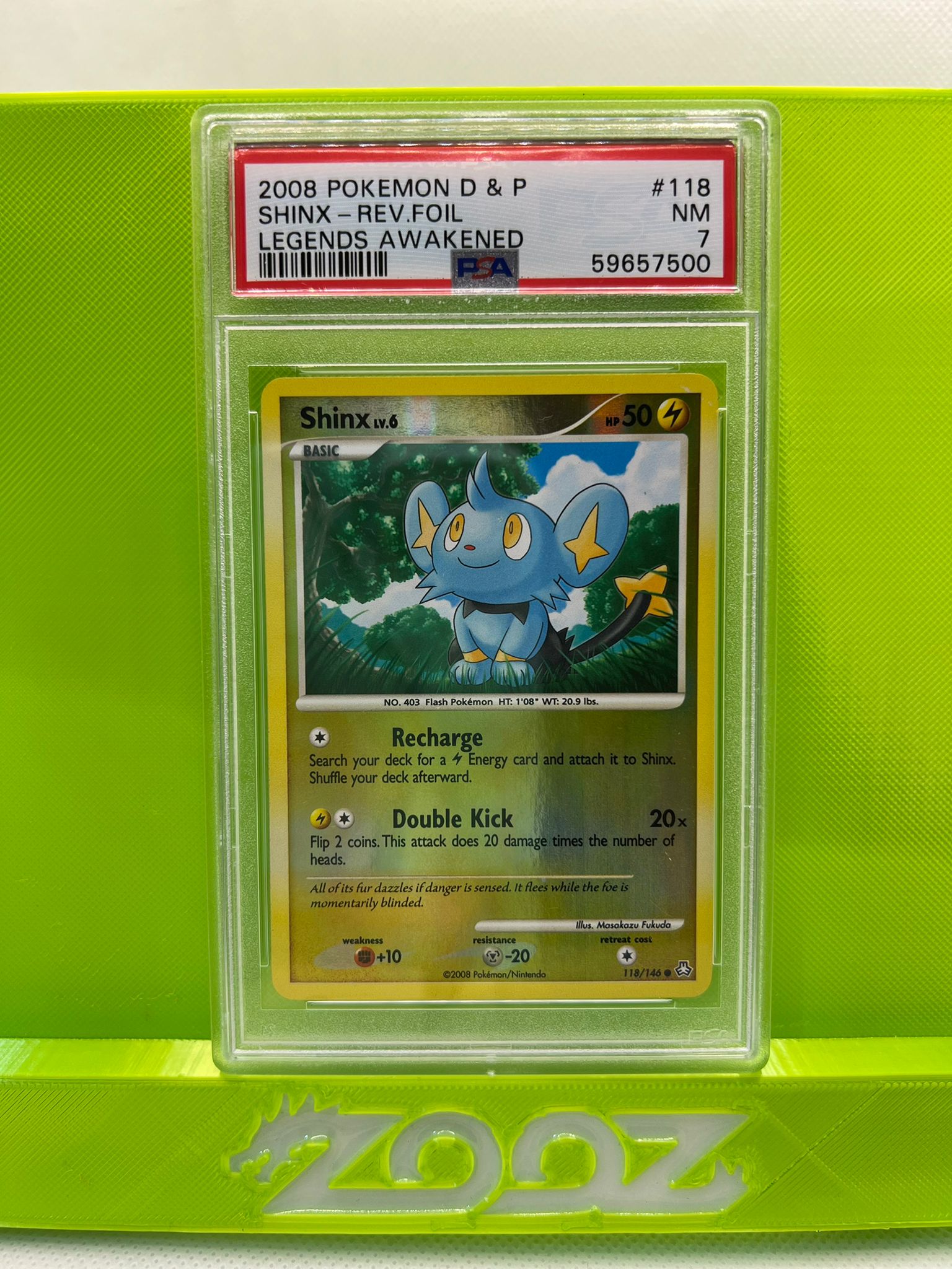 PSA 7 Pokemon D&P Shinx #118 Legends Awakened Reverse Foil